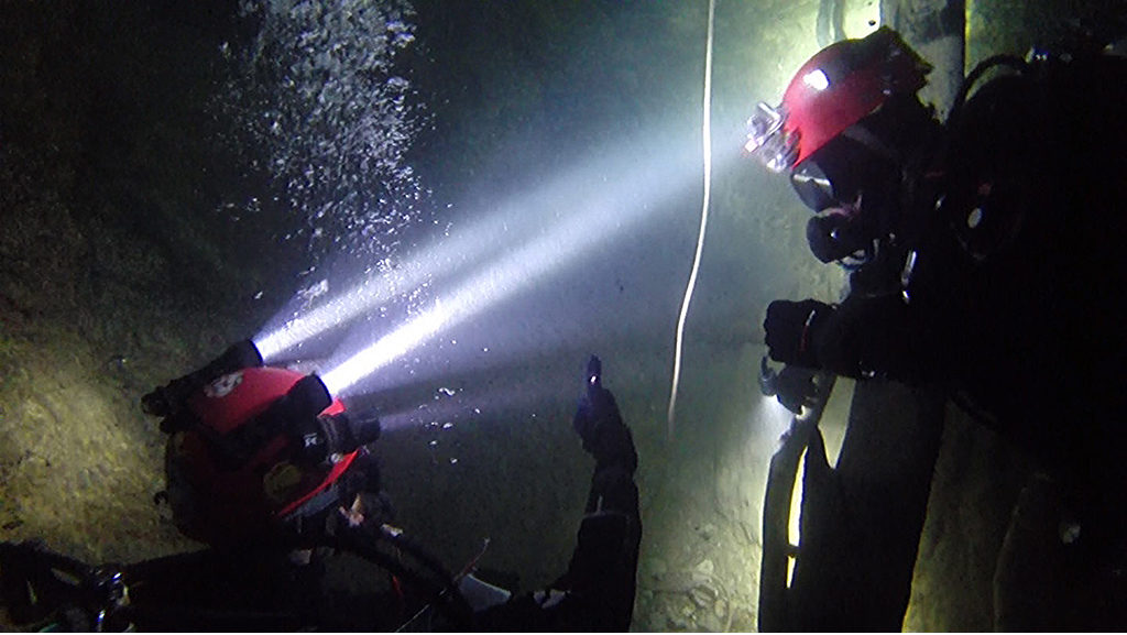 Divers in the eastern crater